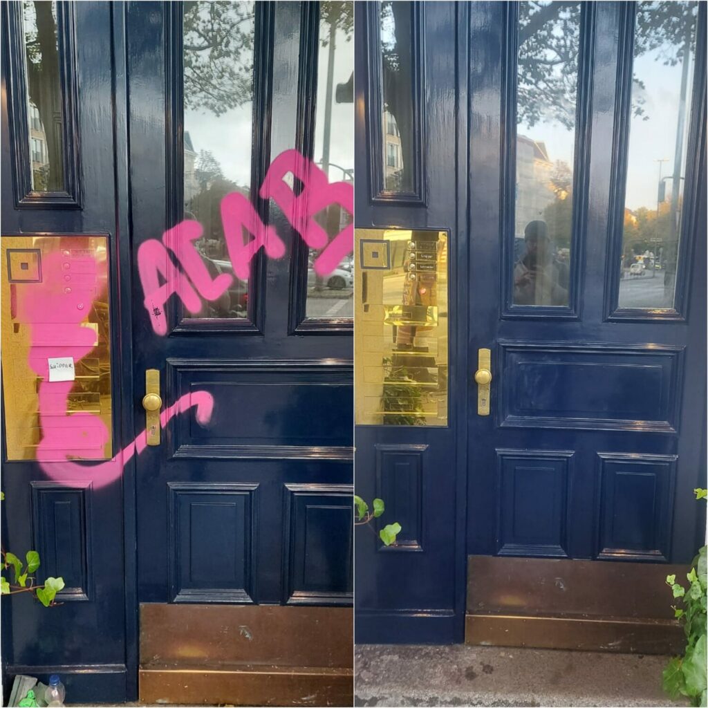 Saubere Haustür nach der Graffitientfernung mit Vorher-Nachher Vergleich